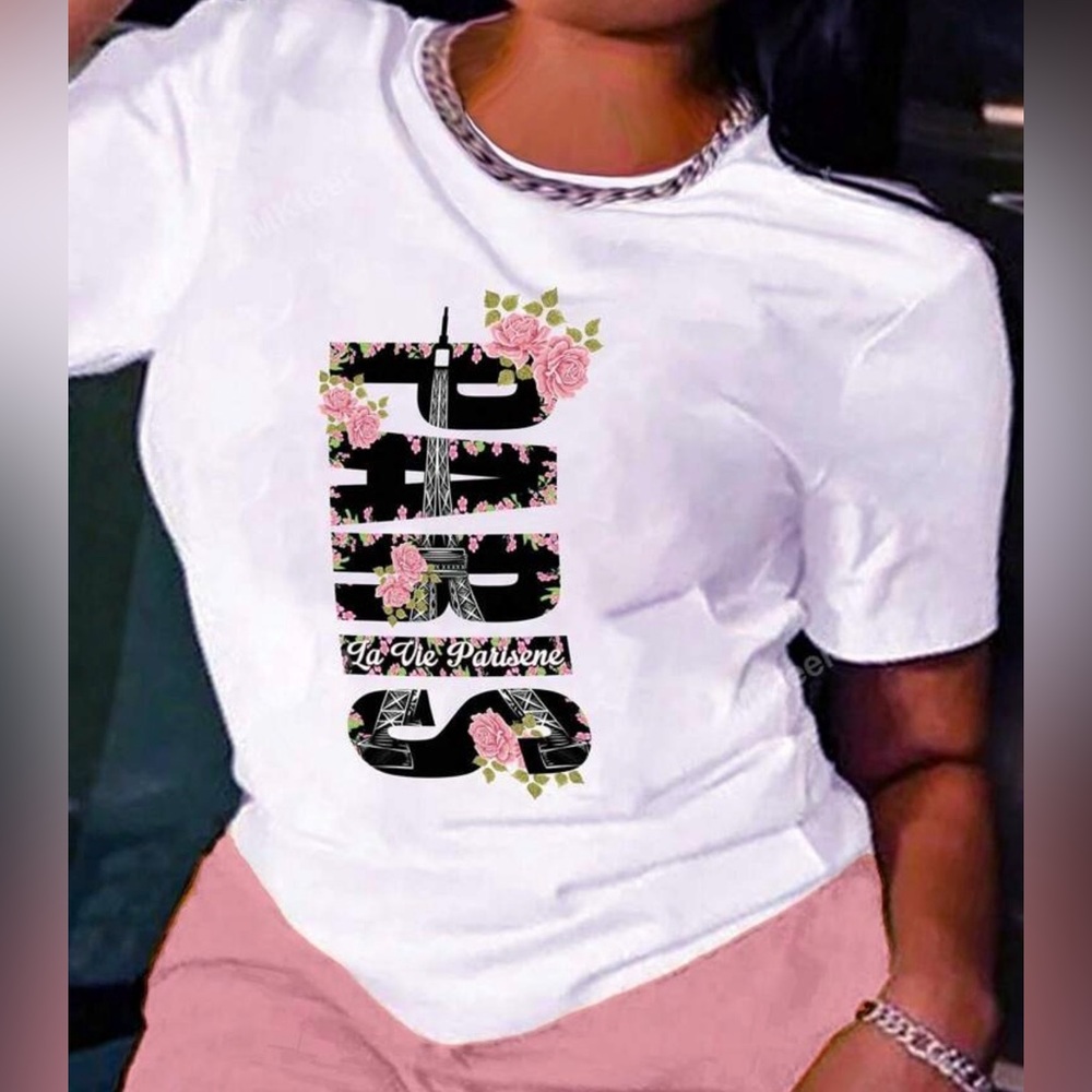 White graphic t-shirt with floral design Size M.